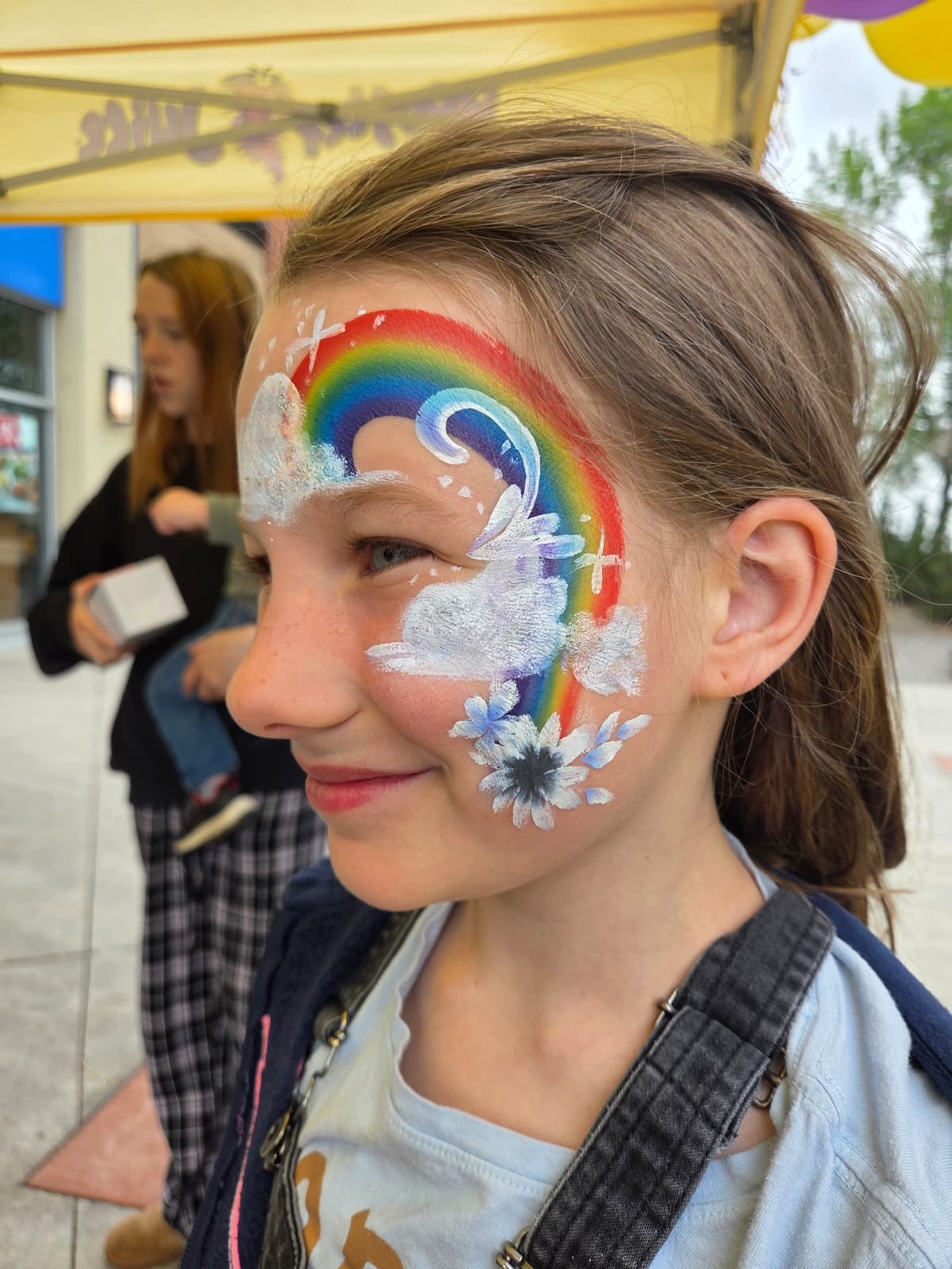 Face painting artist at a children's party event