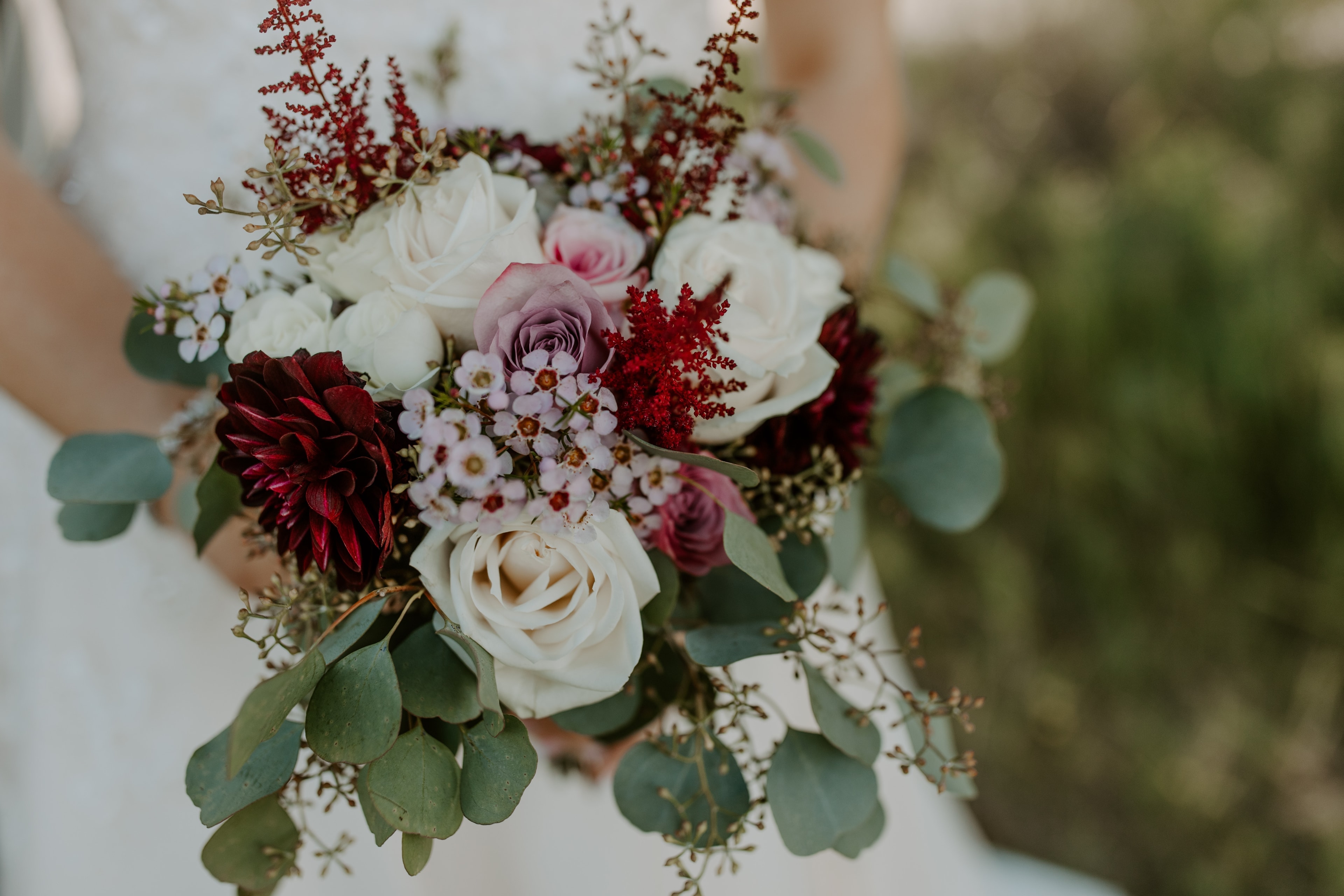 Bridal bouquet with roses and peonies