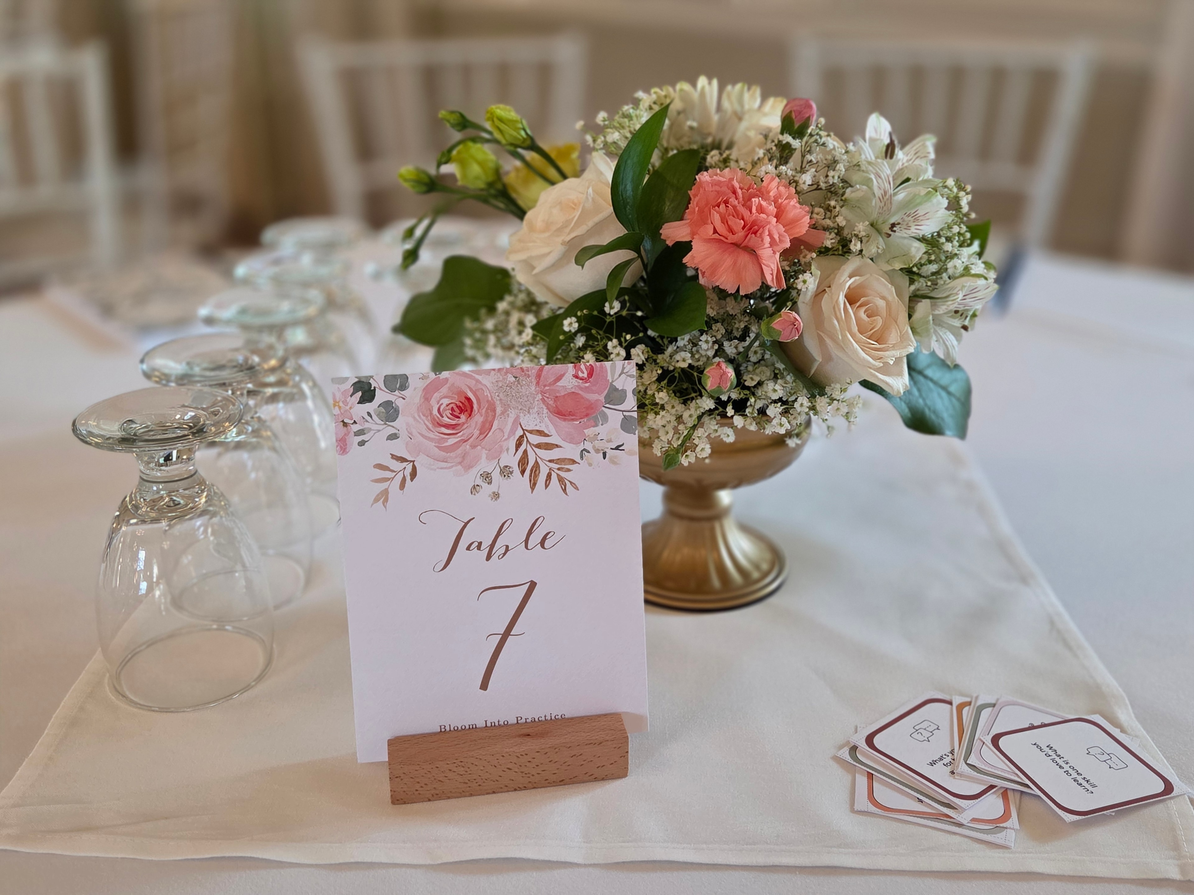Luxury dinner party table flowers candles intimate setting