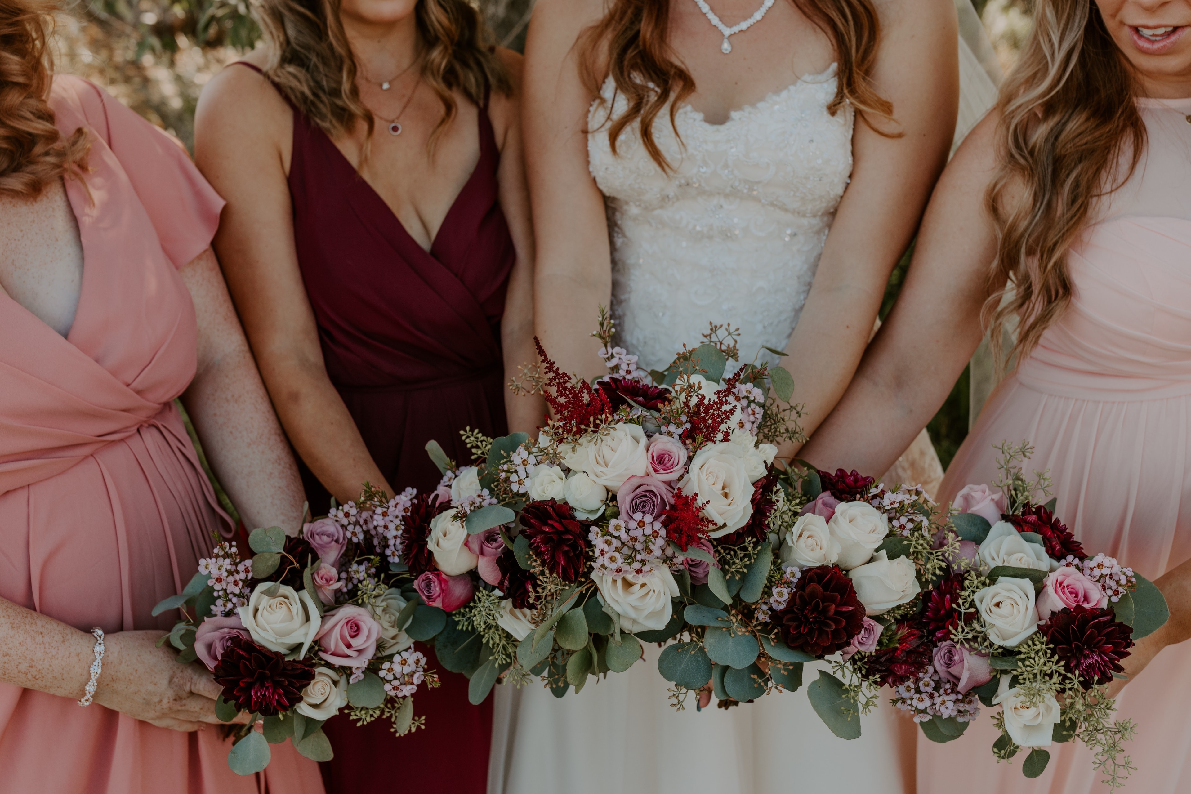 Bridal bouquet with white roses and garden blooms