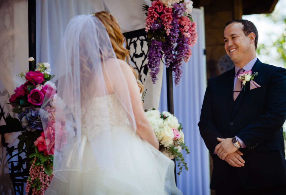 Wedding reception tall floral centerpiece with luxury roses
